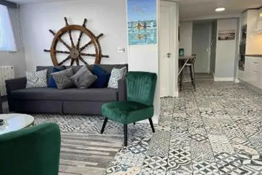 The Skerries Lifeboat House - The Captain's Wheel and Anchor - Living area - 540x360