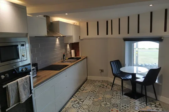 The Skerries Lifeboat House - The Seaview Terrace - kitchen and dining table - 540x360